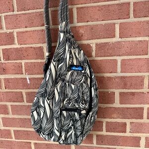 Kavu Black and Cream Leaf Print Sling Bag